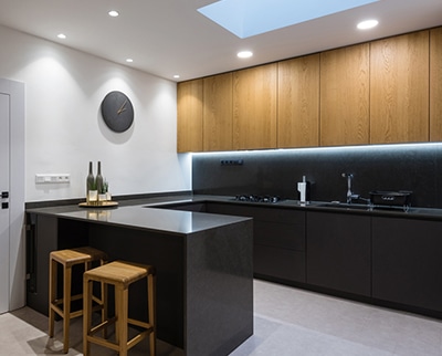 Certified Hotshot experts installing professional living room lighting and recessed ceiling fixtures. Licensed electricians creating modern indoor ambiance for Tulsa area homes.